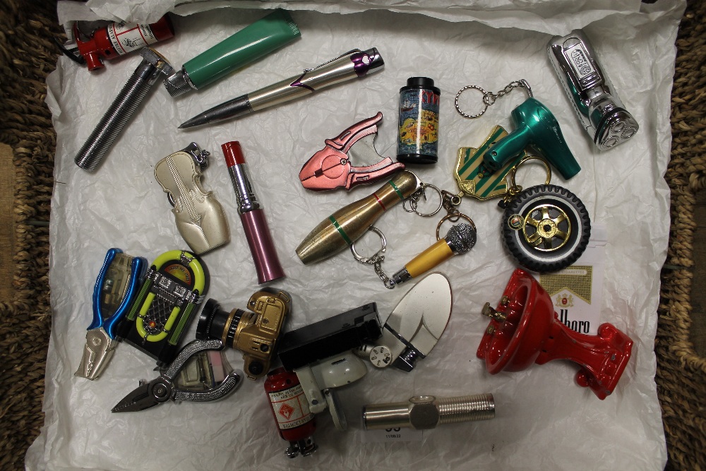 A TWIN HANDLED TRAY OF NOVELTY LIGHTERS