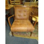 A MODERN RETRO STYLE TAN LEATHER ARMCHAIR S/D PAD LOOSE ON FRAME