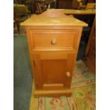 A HONEY PINE SIDE CABINET