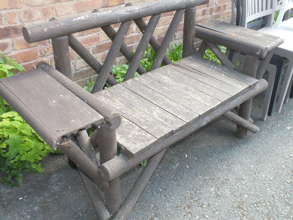 A RUSTIC SCRATCH BUILT GARDEN BENCH SEAT