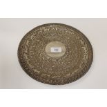 A SUB CONTINENTAL WHITE METAL DECORATIVE CHARGER DECORATED WITH ANIMALS, DIA 27 CM