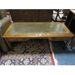 A REPRODUCTION LEATHER TOPPED COFFEE TABLE W-123 CM