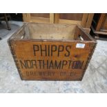 `A VINTAGE STYLE WOODEN 'PHIPPS BREWERY' BOTTLE CRATE H-29 W-40 CM