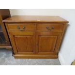 A REPRODUCTION SMALL OAK DRESSER BASE H-80 W-89 CM