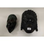 A NIGERIAN GREEN PAINTED IBIBIO SICKNESS MASK AND A YORUBA MASK (2)