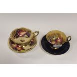 TWO AYNSLEY ORCHARD GOLD TEA CUPS AND SAUCERS WITH FRUIT PATTERN INTERIORS
