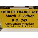 A 2011 TOUR DE FRANCE ROAD SIGN - H 49 CM BY 100 CM