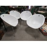 A SET OF FOUR MODERN WHITE EGG CHAIRS