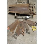 A TRAY OF RUSTY SAWS