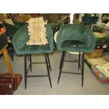 A PAIR OF MODERN UPHOLSTERED GREEN VELVET BAR STOOLS