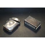 A HALLMARKED SILVER VESTA CASE TOGETHER WITH A HALLMARKED SILVER MATCHBOX COVER