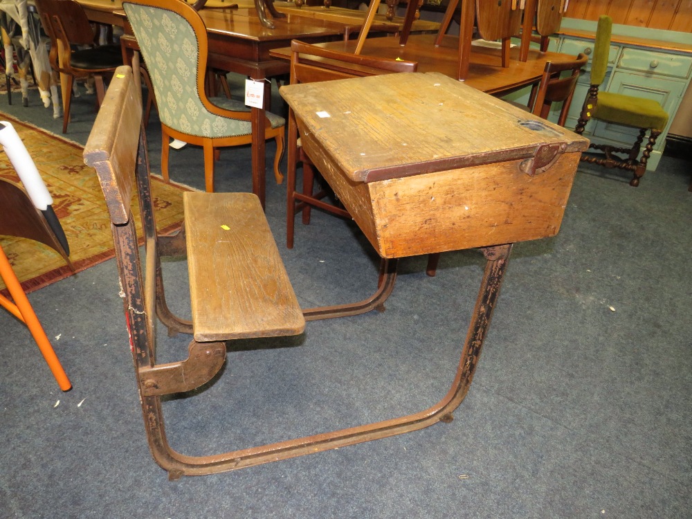 A VINTAGE CHILDS SCHOOL DESK AND JOINED CHAIR