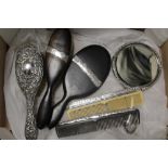 A BOX OF SILVER AND SILVER BANDED DRESSING TABLE ITEMS