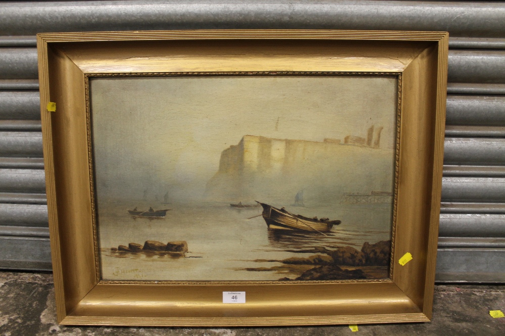 A PAIR OF GILT FRAMED OIL ON CANVAS OF COASTAL SCENES WITH MOORED BOATS SIGNED J H HEWITT, 1921 -