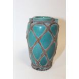 A VINTAGE ORIENTAL STYLE TWIN HANDLED GREEN CERAMIC VASE WITH OUTER STRING BANDING - H 12 CM