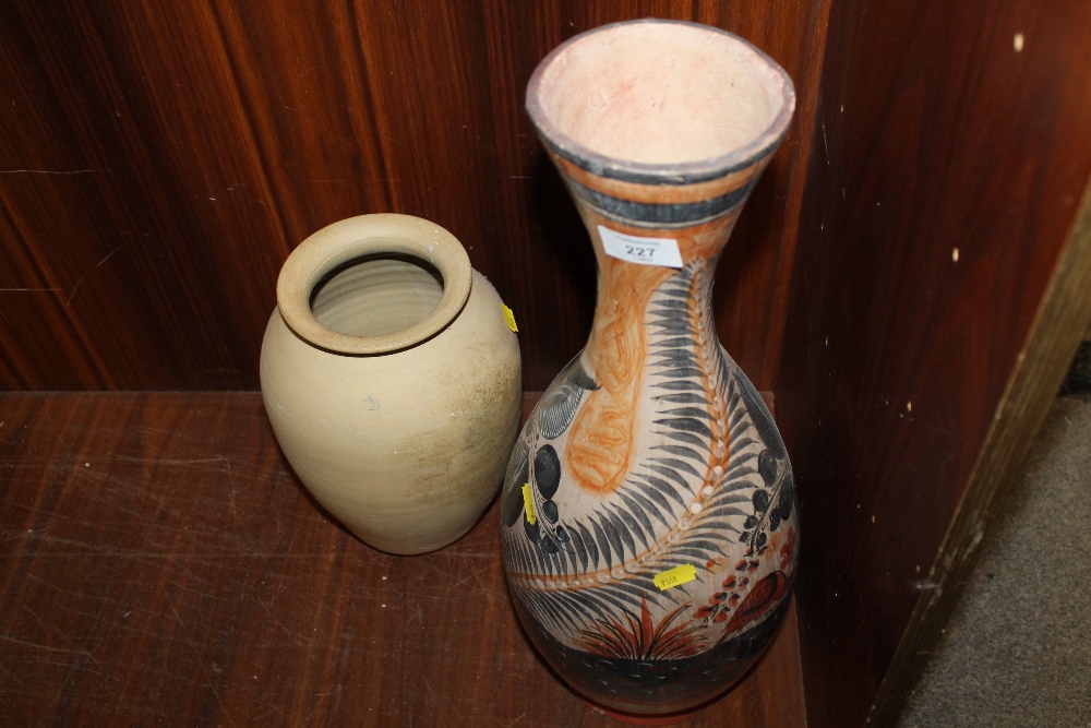 A LARGE HAND PAINTED VASE, TOGETHER WITH A SMALLER EXAMPLE (2)