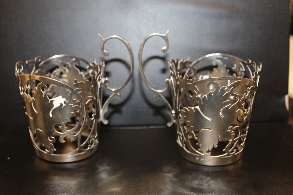 A PAIR OF HALLMARKED SILVER PIERCED BEAKER HOLDERS - H 10.5 CM - Image 2 of 3