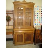 A VICTORIAN GLAZED STRIPPED MAHOGANY BOOKCASE H-223 W-105 CM