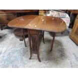 AN EDWARDIAN MAHOGANY SUTHERLAND TABLE