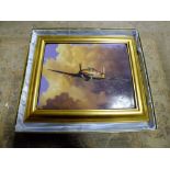 A BOXED FRAMED LIMITED EDITION RAF INTEREST CERAMIC PLAQUE OF A HURRICANE