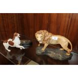 A BESWICK MATTE FINISH LION ON A ROCK FIGURE, TOGETHER WITH A BESWICK SPANIEL FIGURE - LOOSE FROM