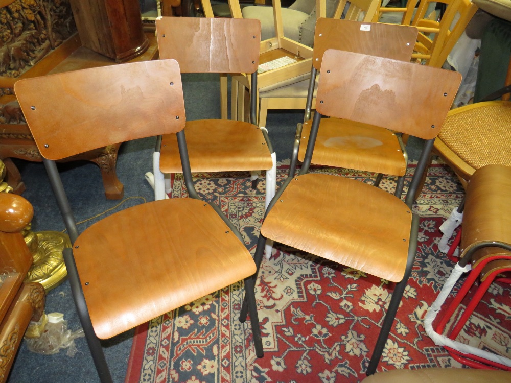 A SET OF FOUR INDUSTRIAL STYLE METAL AND PLY CHAIRS