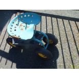 CHILDS SIT ON TROLLEY WITH TRACTOR STYLE SEAT