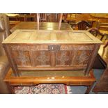 AN ANTIQUE OAK COFFER OF SMALL PROPORTIONS H-50 W-103 CM