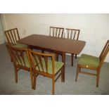 A RETRO EXTENDING DINING SET, TABLES AND SIX CHAIRS