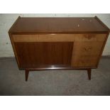 A RETRO SIDEBOARD WITH TAMBOUR DOOR