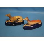 TWO 19TH CENTURY STAFFORDSHIRE GREYHOUND FIGURES