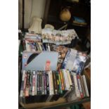 TWO BOXES OF DVDS TO INCLUDE PORRIDGE, DAD'S ARMY ETC TOGETHER WITH A SMALL QUANTITY OF CDS