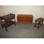 A TEA SERVING TROLLEY, A SMALL OCCASIONAL DROP LEAF TABLE AND A TEAK RETRO SWIVEL SIDEBOARD