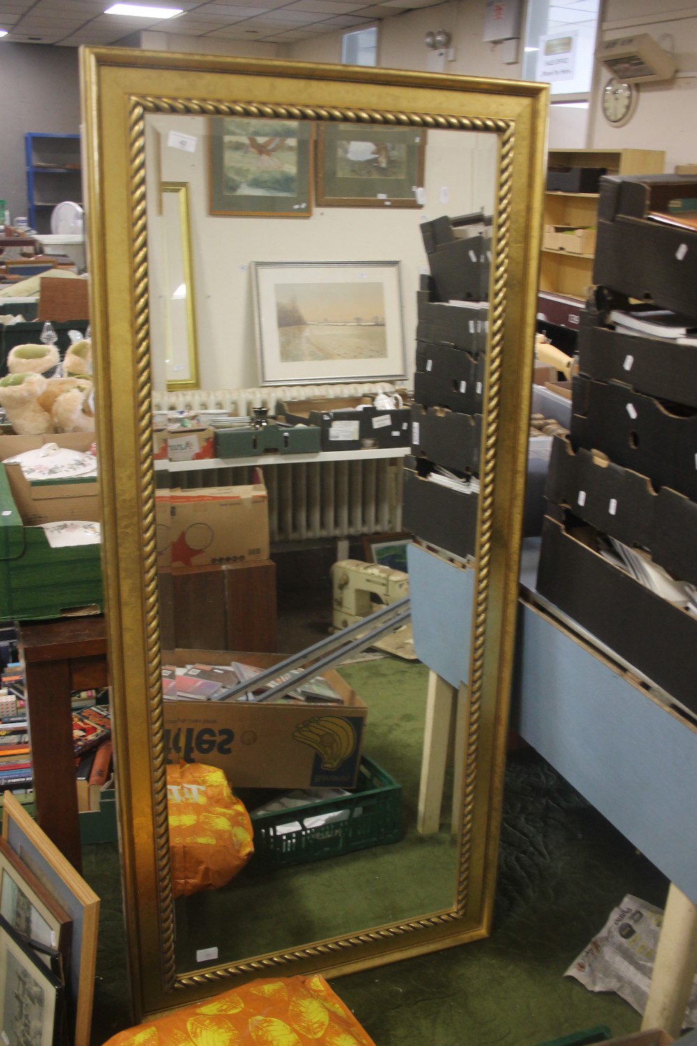 A LARGE BEVEL EDGED MIRROR IN GILT FRAME, 164 X 74 CM