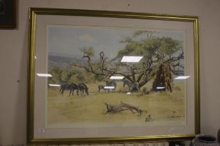 A LARGE LIMITED EDITION SIGNED PRINT BY DONALD GRANT TITLED "ZEBRAS GRAZING" IN A GILT FRAME, 116