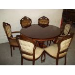 AN ITALIAN STYLE DINING SET, SIX CHAIRS AND A TABLE