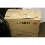 A BOXED OLYMPIA TYPEWRITER