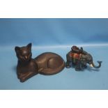 A CAST FIGURE OF A CAT TOGETHER WITH AN ELEPHANT MONEY BOX