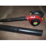 A RYOBI PETROL LEAF BLOWER VAC