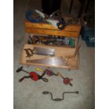 A WOODEN CARPENTER'S TOOL BOX AND CONTENTS