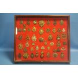 FRAMED MILITARY BADGES TO INCLUDE NUMBERED TYPES, ROYAL IRISH RIFLES, SOUTH LINCOLNS ETC.
