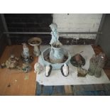 A QUANTITY OF CONCRETE AND PLASTIC GARDEN STATUES TO INCLUDE A FOUNTAIN