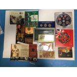 A COLLECTION OF BRITISH COIN SETS AND BANK NOTES TO INCLUDE 2003 PROOF SET, 2007 PROOF SET ETC