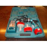 A BOXED MAKITA CORDLESS DRILL / SCREWDRIVER