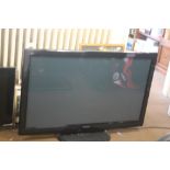 A PANASONIC 50" FLAT SCREEN TV WITH REMOTE