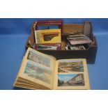 VINTAGE POSTCARDS IN ALBUMS AND LOOSE, SUBJECTS INCLUDE WALES, THE WIRRAL, LONDON ETC.