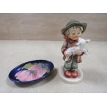 A MOORCROFT MAGNOLIA PATTERN PIN DISH TOGETHER WITH A GOEBEL FIGURE (2)