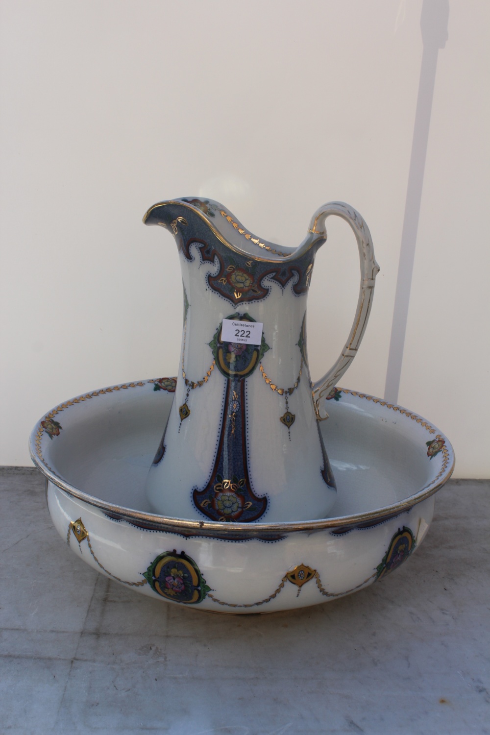 A BUXTON CERAMIC WATER JUG AND WASHBOWL