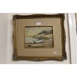 A GILT FRAMED OIL ON BOARD DEPICTING MOORED BOATS SIGNED LOWER LEFT AND INSCRIBED VERSO - -H 20 CM