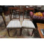 A PAIR OF EDWARDIAN MAHOGANY INLAID BEDROOM CHAIRS